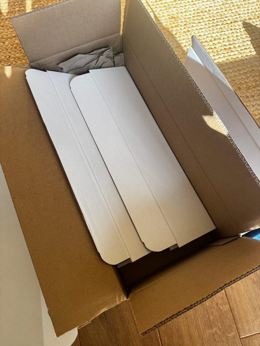 A delivery box opened to show the new session cards inside