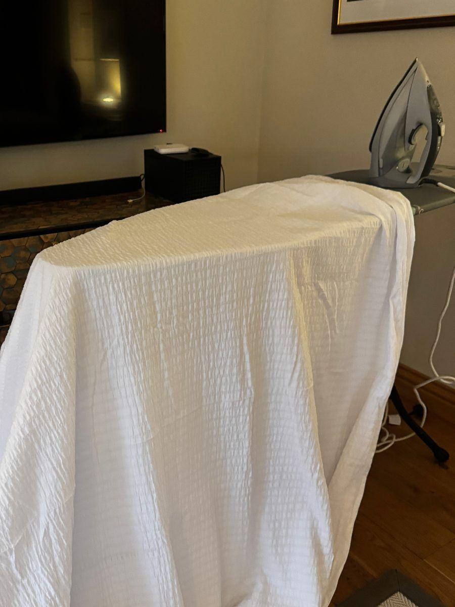 Ironing the sheets before the shoot