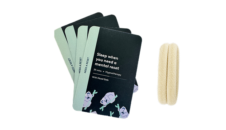 Four hypnotherapy session cards and a hair tie