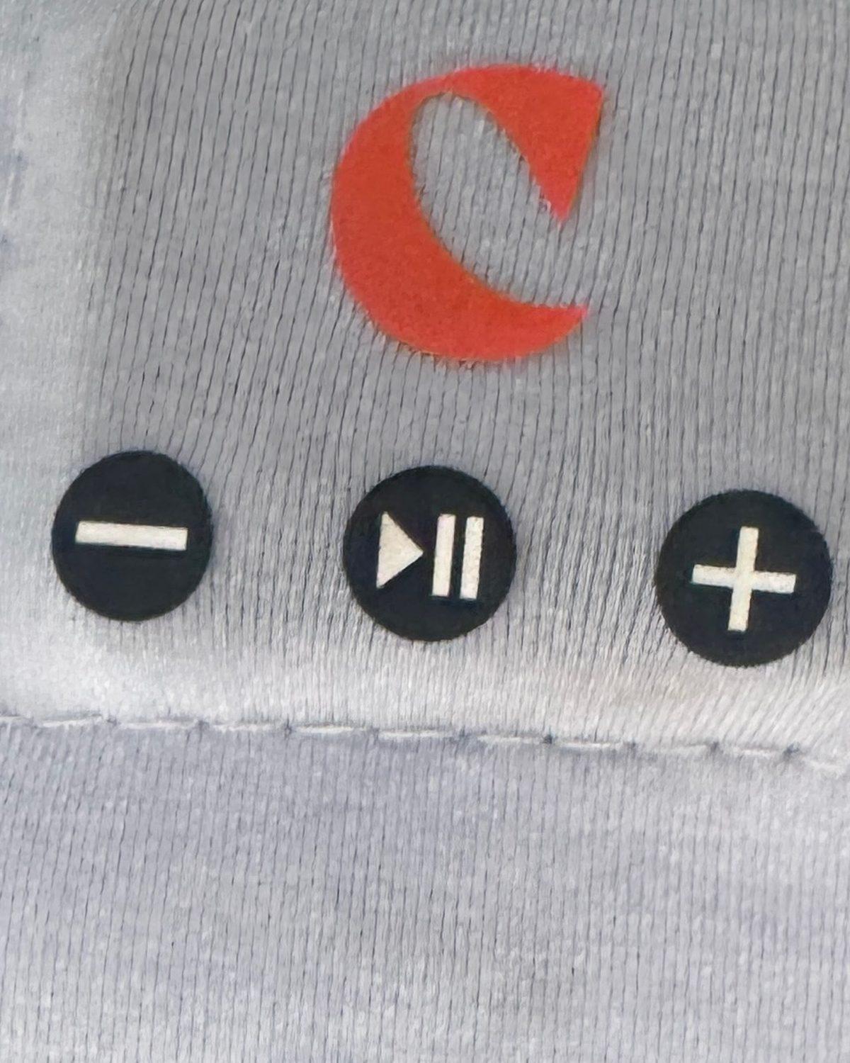 The Clementine sleep band’s three buttons, close up: minus, play and plus