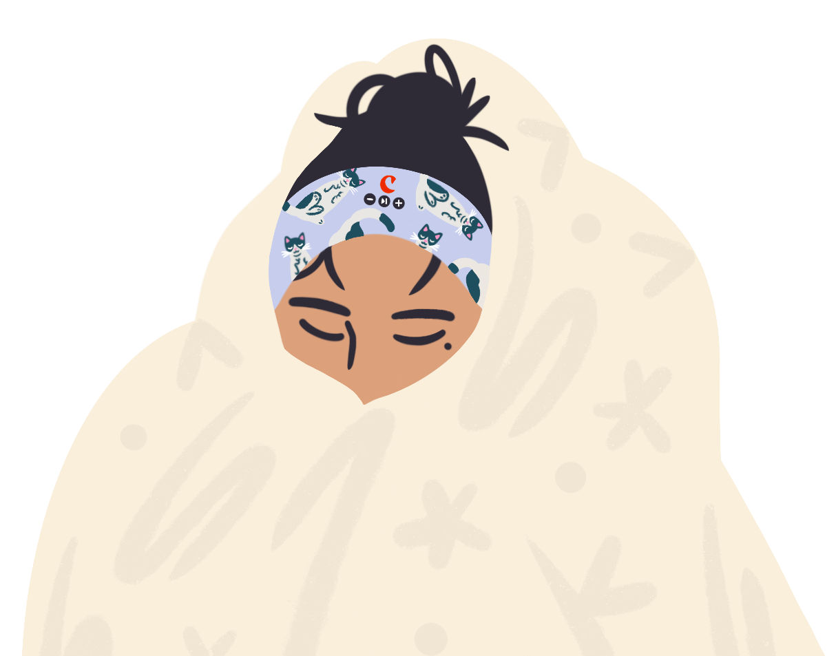 A woman wrapped in a blanket, asleep wearing the Clementine sleep band